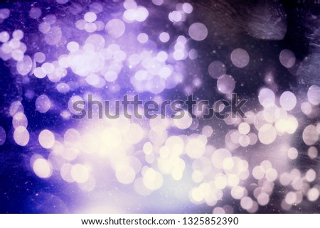 Abstract bokeh background. Christmas Glittering background. Abstract christmas background. Glittering Christmas background.
