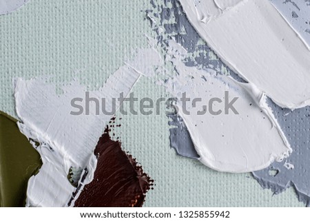 abstract strokes of white and gray oil paint on canvas