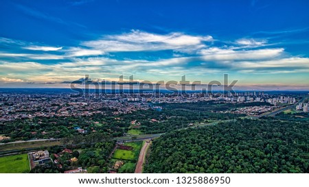 Aerial view of the city of Ribeirão Preto, Sao Paulo - Brazil, at sunset with blue sky with clouds