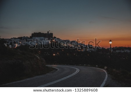 the road to the city at sunset