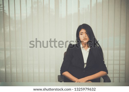Close up sad woman in the office,stress girl from hard work,Heartbreak from boyfriend,Thailand people