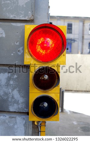 red light of the traffic light indicates that it is not possible to pass: stop, stop, do not go