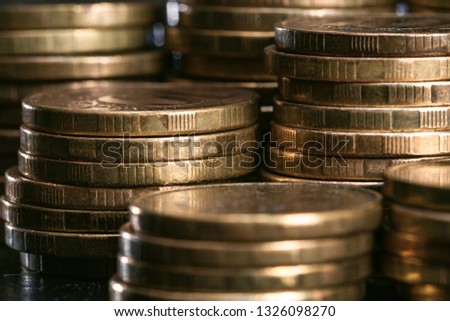 money stacks metal coins closeup. selective focus
