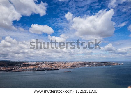 aerial view of Lisbon city from opposite side of the river Tagus, Portugal