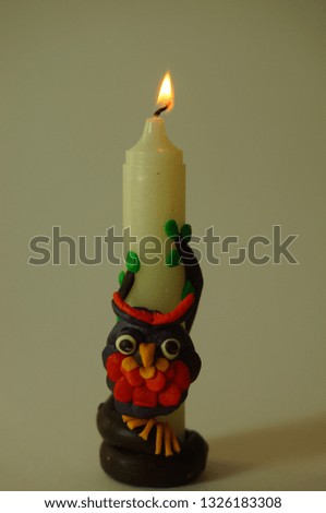 decorated with burning candle