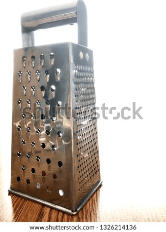 Metal cheese grater close up