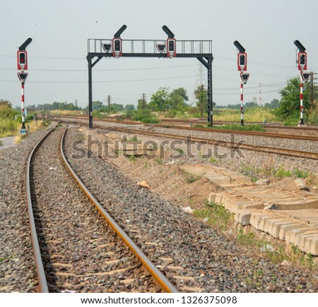 The railway signalling poles and light
