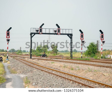 The railway signalling poles and light
