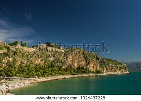 south medieval castle rock along sea waterfront picturesque vivid colorful scenery landscape photography of tropic district of Earth, travel and vacation concept