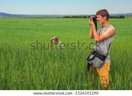 Two photographers takes a pictures of nature 