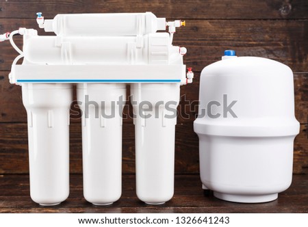 Osmosis water purification filter for home use. healthy lifestyle
 Royalty-Free Stock Photo #1326641243