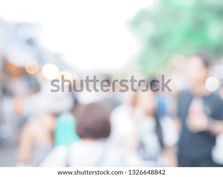Blurred image of people at the crowded marketplace. may use for background