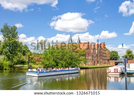 Boat at the Trave near the Holstentor in Lübeck, Germany 
