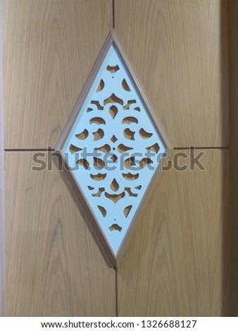 White pattern, white square, python cut On brown wood floors