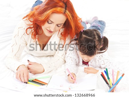 Mother and daughter drawing isolated on white background