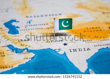 the Flag of pakistan in the world map Royalty-Free Stock Photo #1326741152