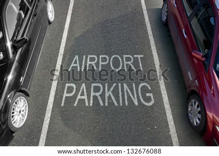 Empty airport parking bay with white markings