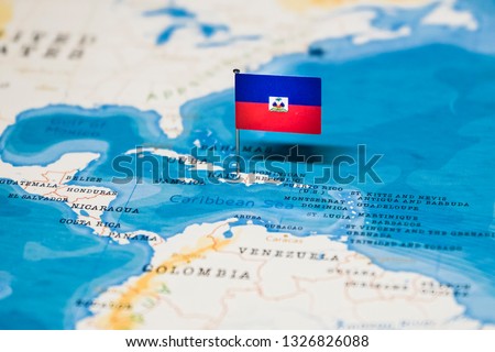the Flag of haiti in the world map Royalty-Free Stock Photo #1326826088