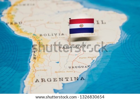 the Flag of paraguay in the world map Royalty-Free Stock Photo #1326830654