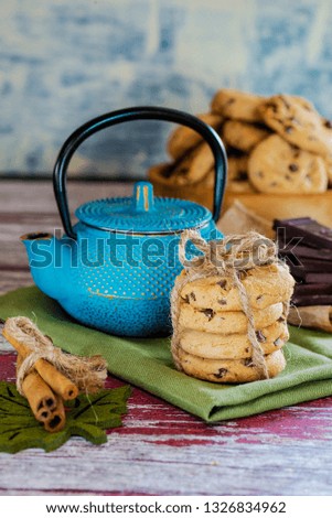 kettle cookies and tea on the table for breakfast