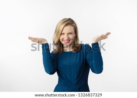 Beautiful Blonde Woman Posing in Blue Dress 