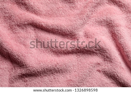 Crumpled soft terry towel as background. Space for design