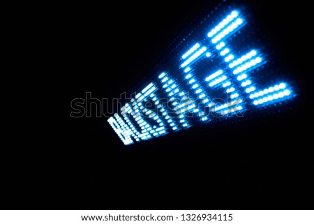 neon inscription backstage on black background