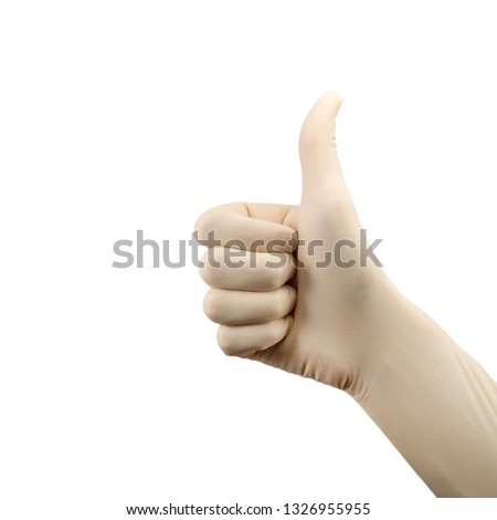 hand showing sign well excellent OK, rise thumb in sterile latex surgical glove isolated on white background