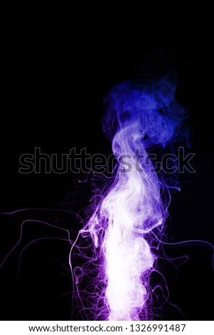 Column of vape clouds splash on black background. A lot of lines of smoke. Two colours fog is blue and purple. Stock isolated color smoke with spray boiling liquid.