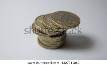 Pile of one euro coins