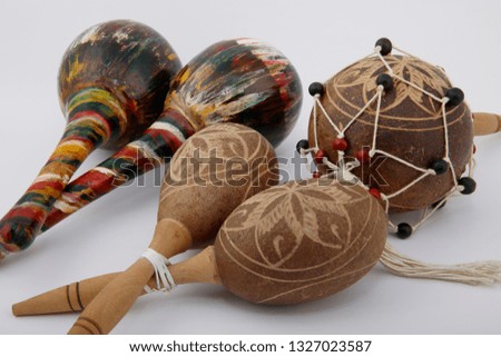 Folkloric musical instruments.
A view of Latin rhythm instruments used in Cuban music, on white background.