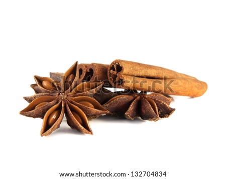 Cinnamon sticks and anise stars. Isolated on white background.