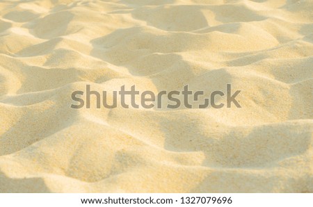 Close up fine beach sand in the summer sun. Soft texture beach sand