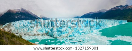 Panoramic picture of an old turquoise ice of Perito Moreno glacier. Los Glaciares national park, Argentina