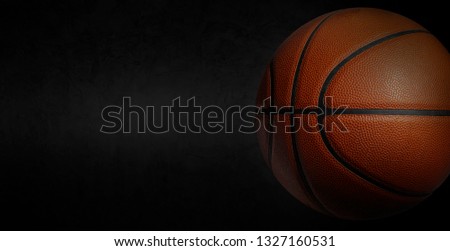 Brown basketball made from beautiful leather on floor plaster 