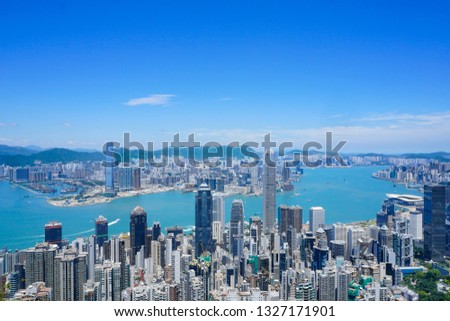 Hong Kong skyline view from Lugard Road near Victoria Peak on a sunny day - Hong Kong, China