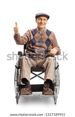 Full length portrait of an elderly disabled man in a wheelchair showing thumbs up isolated on white background