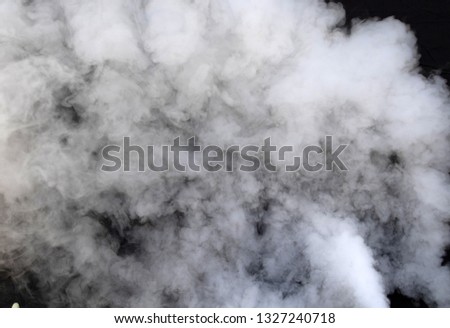 dense smoke isolated on dark background 