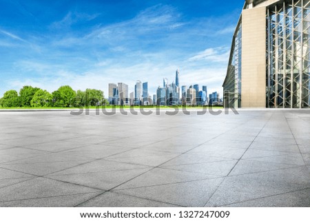 Empty square floor and panoramic city skyline with buildings in shanghai