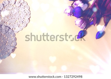 beautiful bright colorful flat lay top view close up photo of tulips and lace on clean background with copy space and magical retro old school lovely effect of light and bokeh