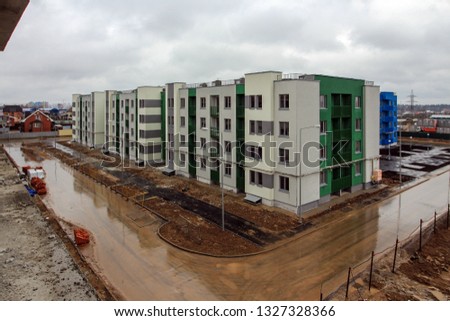Construction of typical monolithic concrete residential apartment building. construction of residential apartment complex. building under construction. facade of modern high-rise multi-storey house 