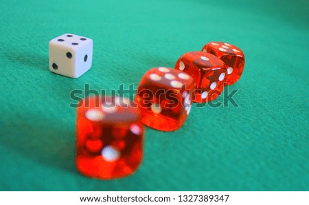 Close up of some dice on green backround