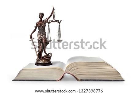 A picture of a Themis statue standing over whitek background
