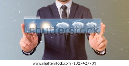 View of a Businessman holding a Weather Forecast widget 3d rendering