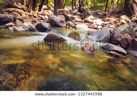 Silky water running through a stream.