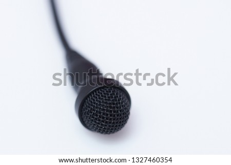 One lavalier microphone isolated on white background macro view