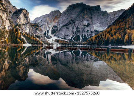 Autumn at Braies lake, Italy. Famous lake in the Dolomites. 