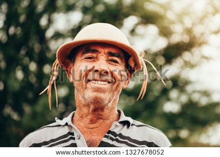 Portrait of Brazilian Northeastern cowboy wearing his typical leather hat. Royalty-Free Stock Photo #1327678052