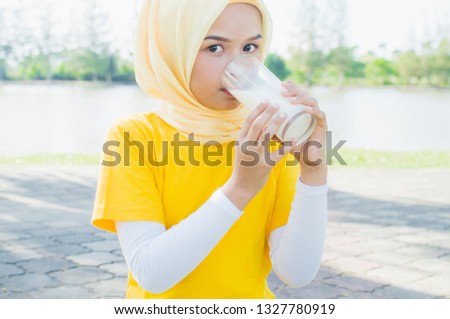 Healthy female Kid in hijab in the park