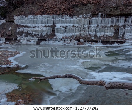 Frozen River With Tree Branch Touching the Unfrozen Stream, Hogback Ridge Ohio